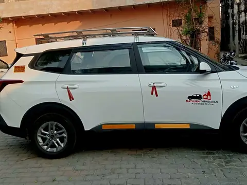 Kia Carens cab of Braj Bhoomi Tour and Travels