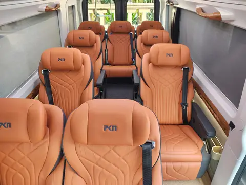 Luxury tempo traveller interior with pushback seats